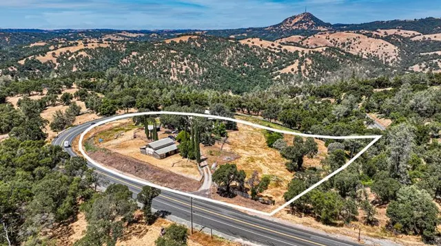 a view of a house with swimming pool