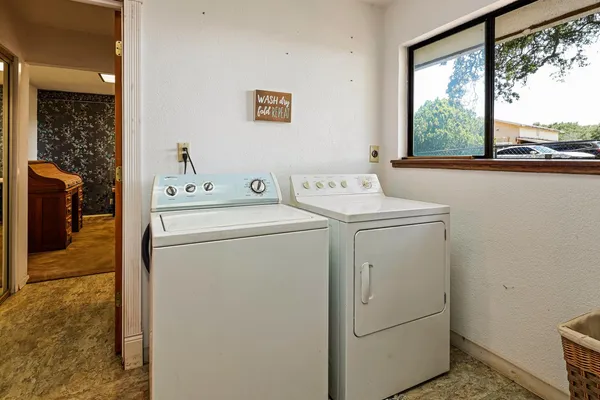 a view of storage and utility room