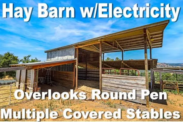 a view of a house with a snow yard and mountain view