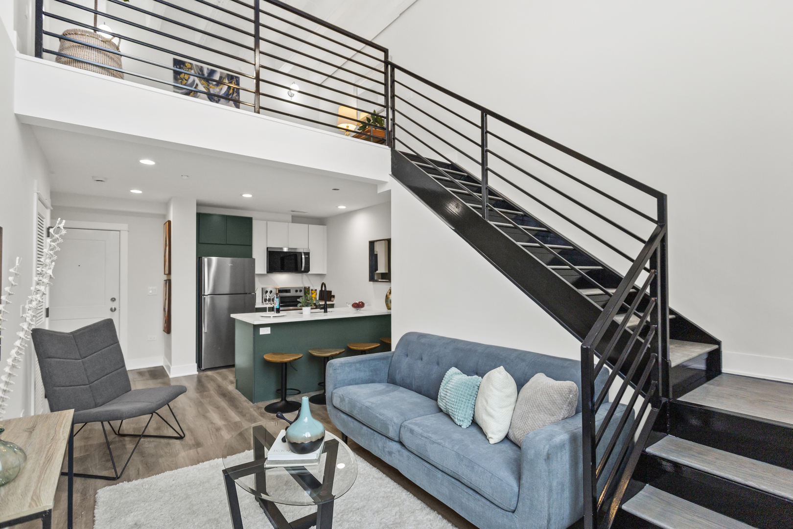 1453 Maple Avenue, Unit 107 Evanston, IL 60201 - Photo 4 of 21 a living room with furniture and a view of kitchen