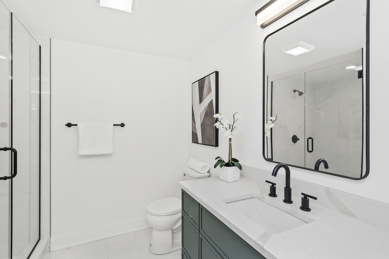 1453 Maple Avenue, Unit 107 Evanston, IL 60201 - Photo 8 of 21 a bathroom with a sink toilet and shower