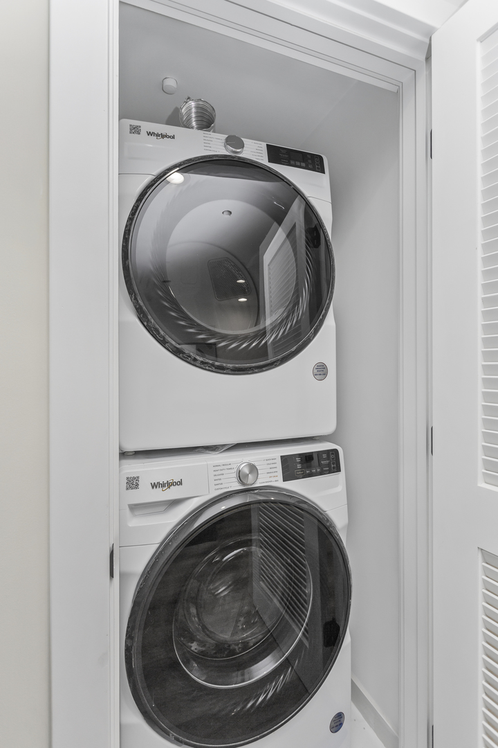 1453 Maple Avenue, Unit 107 Evanston, IL 60201 - Photo 10 of 21 a utility room with washing machine