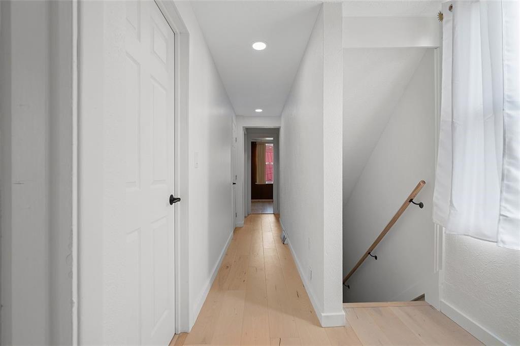 2121 Magnolia Street Pittsburgh, PA 15212 - Photo 17 of 36 a view of a hallway with white walls