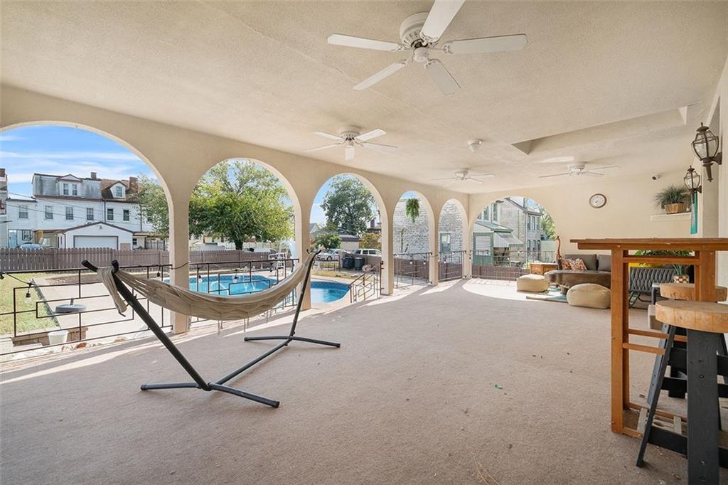 2121 Magnolia Street Pittsburgh, PA 15212 - Photo 2 of 36 a view of a livingroom with furniture and a floor to ceiling window