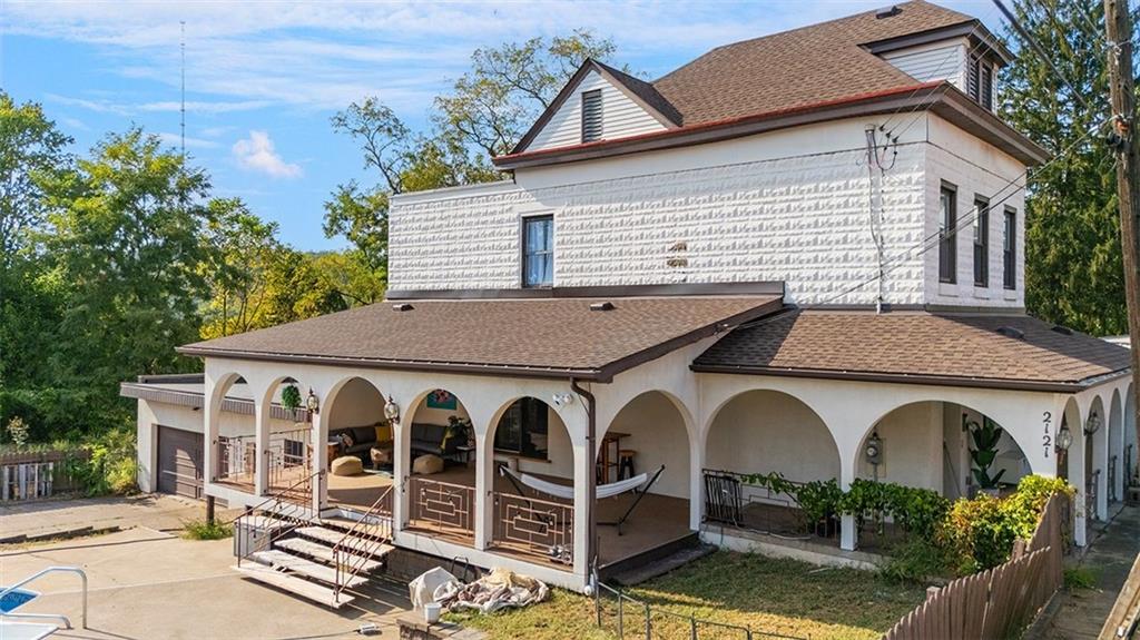2121 Magnolia Street Pittsburgh, PA 15212 - Photo 31 of 36 a front view of a house with garden