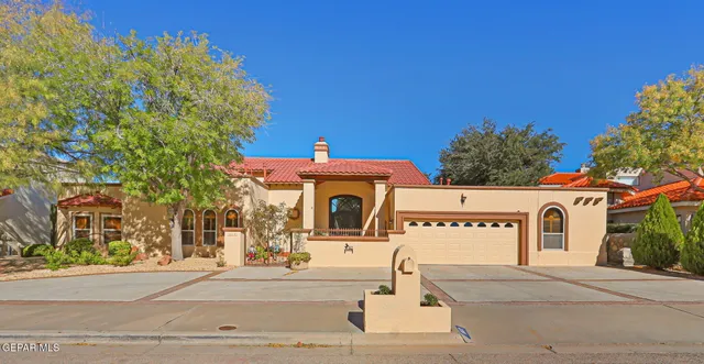 a front view of a building with garden