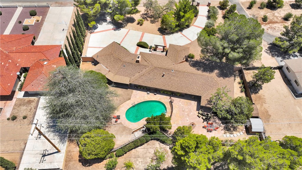 19955 Chickasaw Road Apple Valley, CA 92307 - Photo 54 of 60 an aerial view of a house with a yard and swimming pool