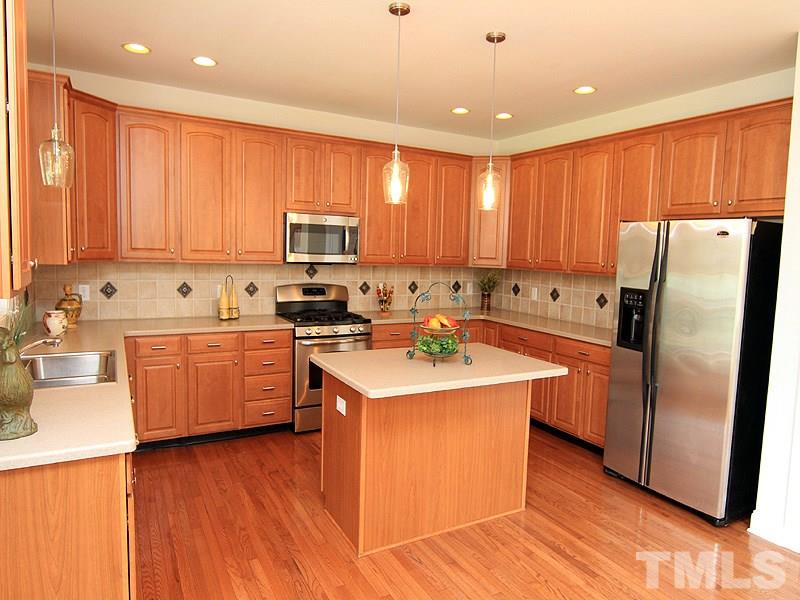 9205 Meadow Mist Court Raleigh, NC 27617 - Photo 8 of 25 Amazing kitchen for the gourmet chef.