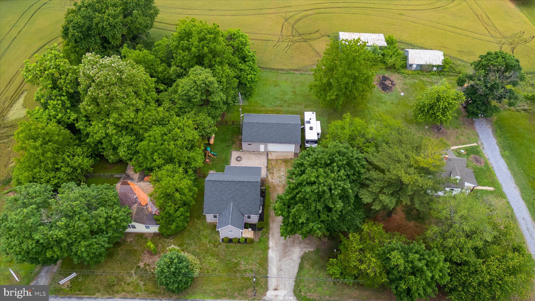 11994 Cordova Road Cordova, MD 21625 - Photo 43 of 57 an aerial view of a house with a yard and large trees