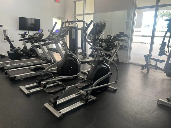 a view of a room with gym equipment