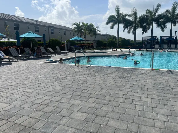 a building with palm tree in front of it