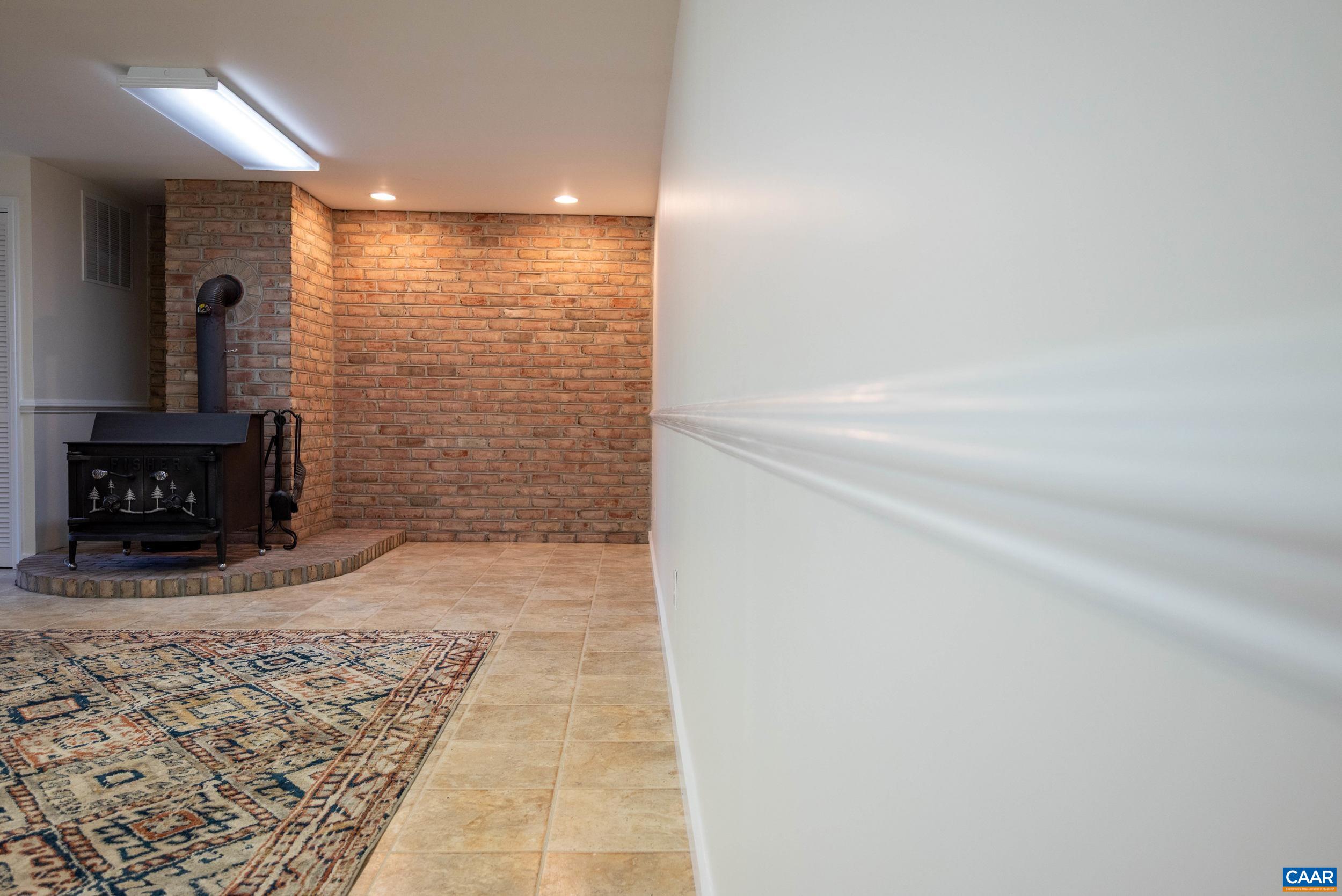 1265 Fredericksburg Road Stanardsville, VA 22973 - Photo 36 of 64 Terrace Level Family Room