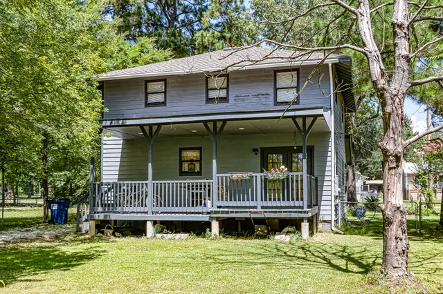 a small pool on the side of the house