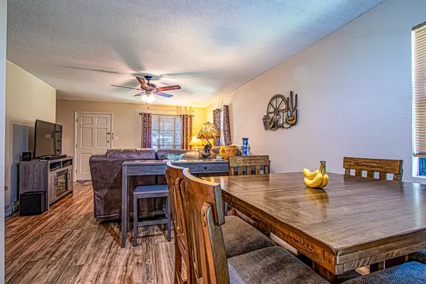 a kitchen with a table and chairs