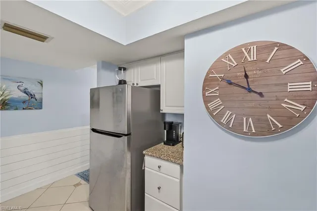 a kitchen with a sink and a window