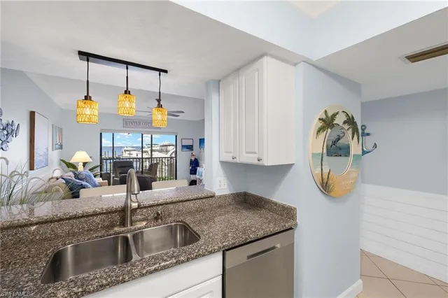 a kitchen with a stove and a sink