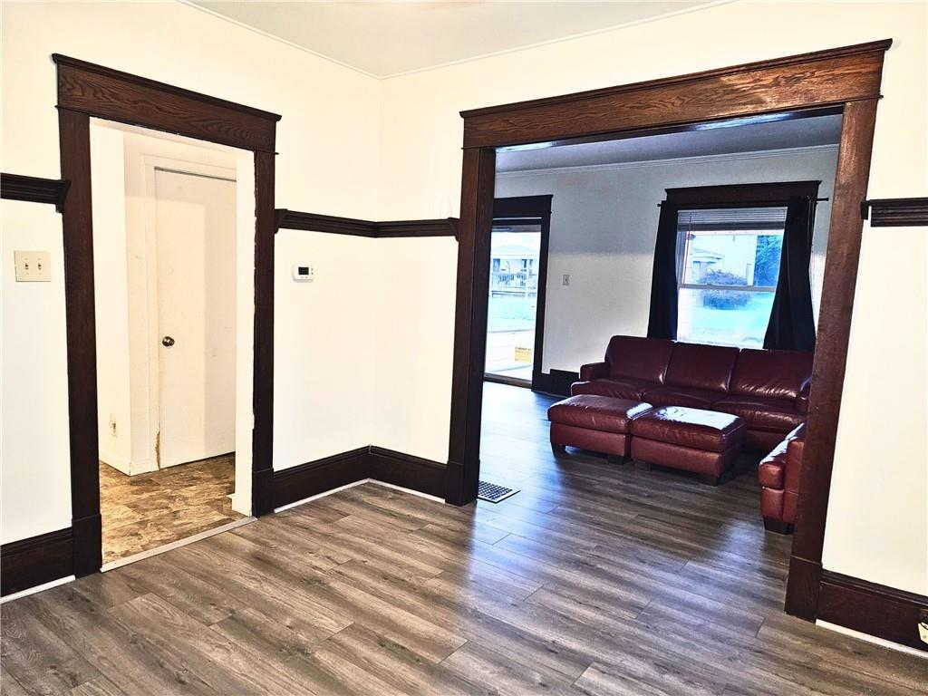 1056 Adams Street New Castle, PA 16101 - Photo 12 of 21 a view of living room with furniture and wooden floor