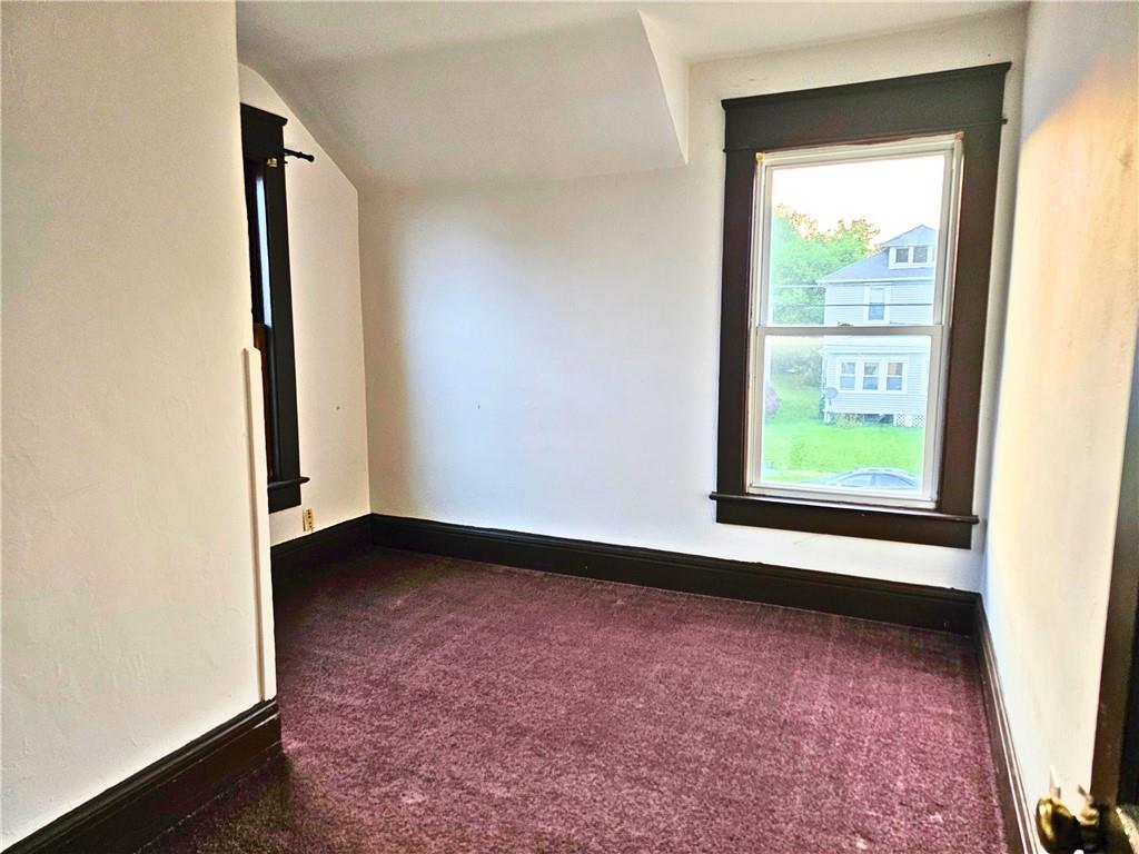1056 Adams Street New Castle, PA 16101 - Photo 17 of 21 an empty room with windows