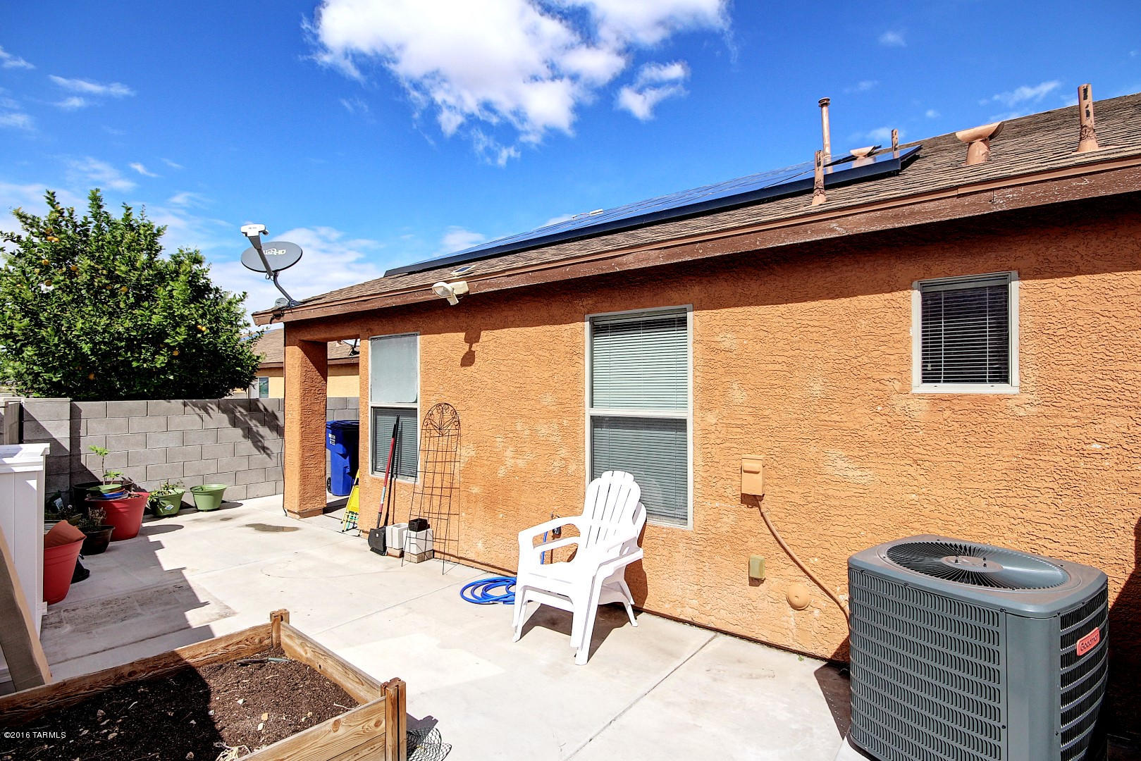 6016 South Avenida Ribero Tucson, AZ 85706 - Photo 15 of 15 a backyard of a house with outdoor seating