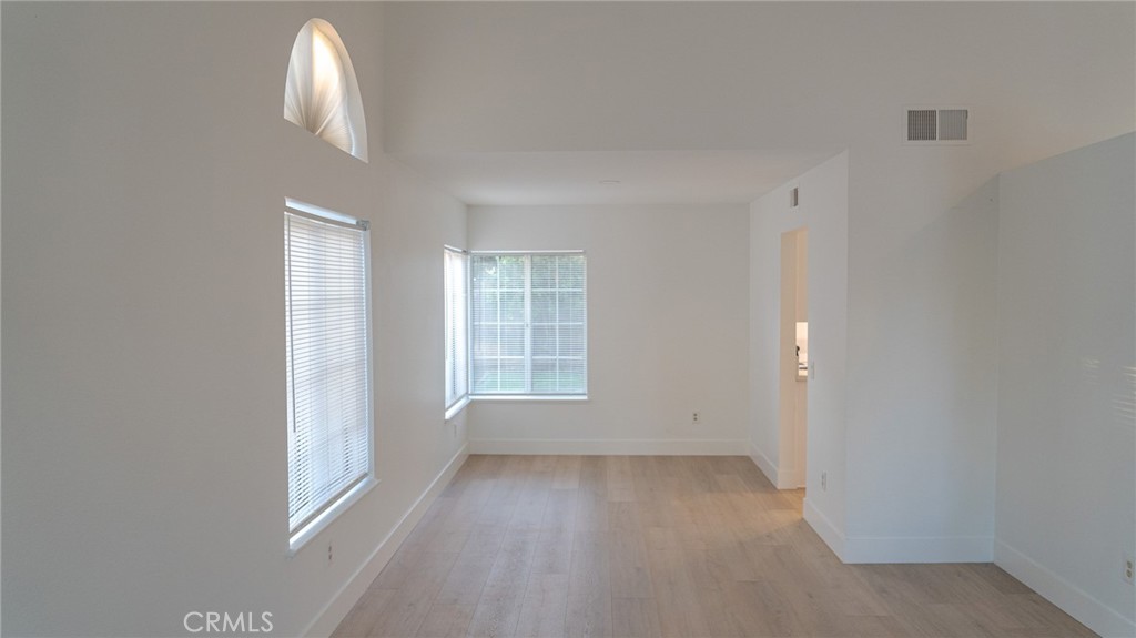 21 Fillmore Irvine, CA 92620 - Photo 14 of 24 an empty room with a empty space and windows
