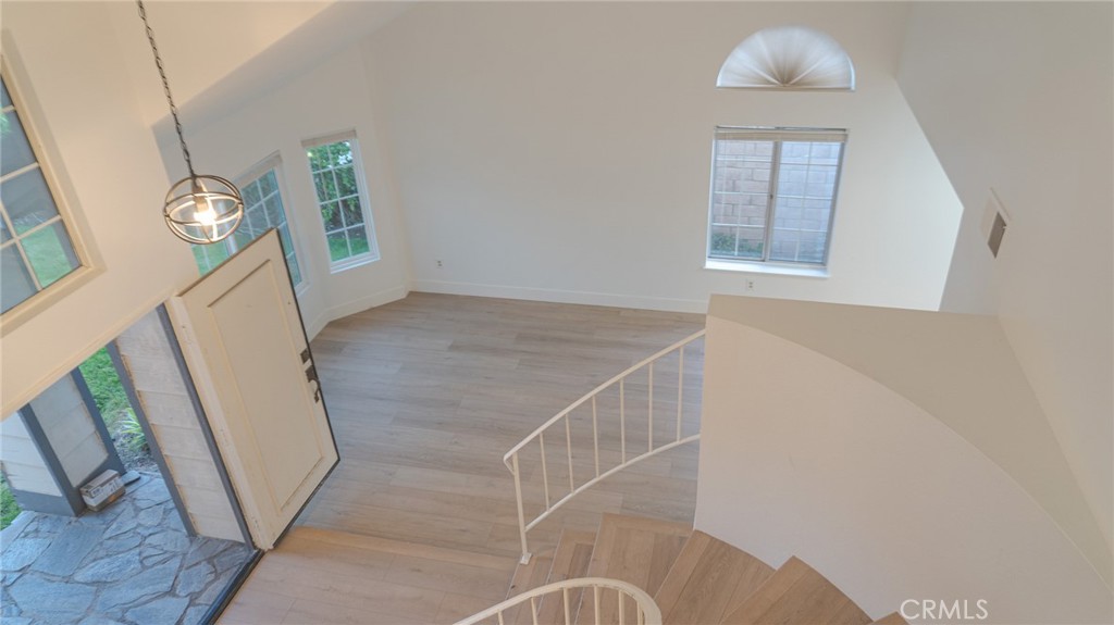 21 Fillmore Irvine, CA 92620 - Photo 22 of 24 a view of entryway and hall with wooden floor