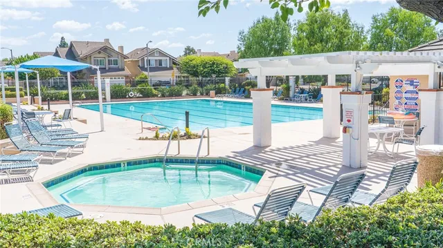 a view of a swimming pool with a patio