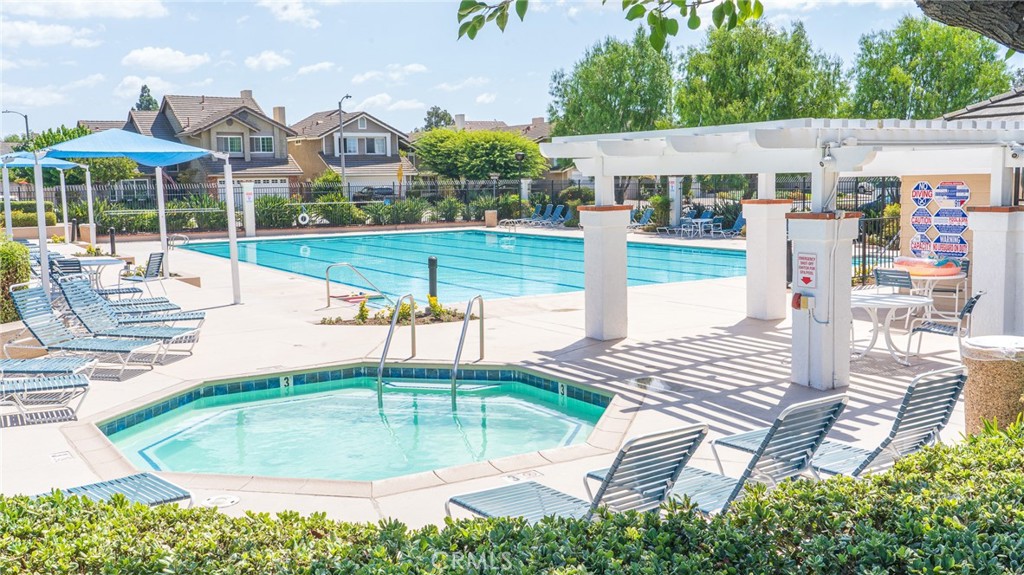 21 Fillmore Irvine, CA 92620 - Photo 3 of 24 a view of a swimming pool with a patio