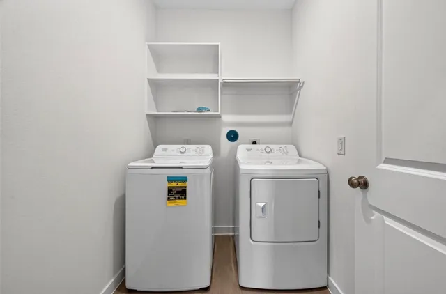a utility room with dryer and washer