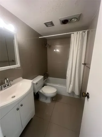 a view of a swimming pool with a lounge chairs