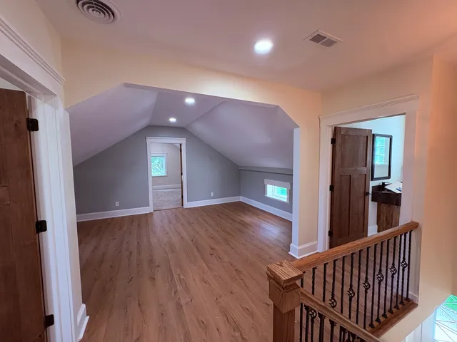 wooden floor in a hall with an entryway