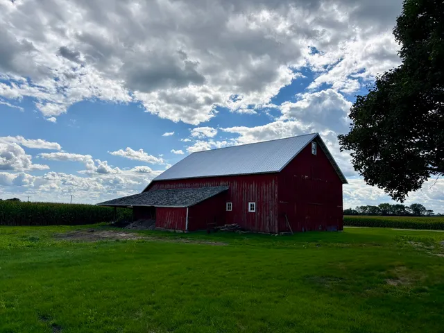 a view of a backyard with garden
