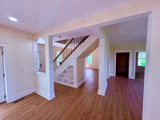 a view of entryway with wooden floor