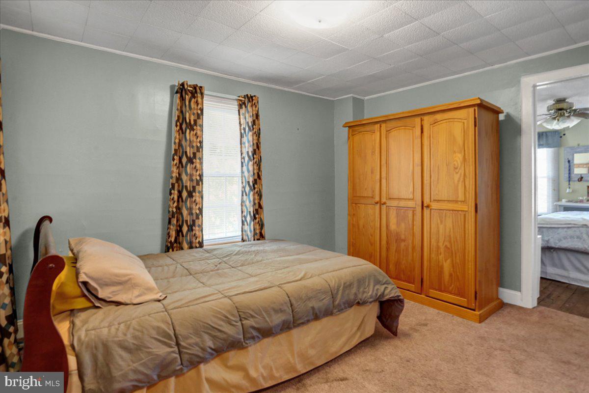 32 2nd Street Shillington, PA 19607 - Photo 13 of 26 a bedroom with a bed and a window