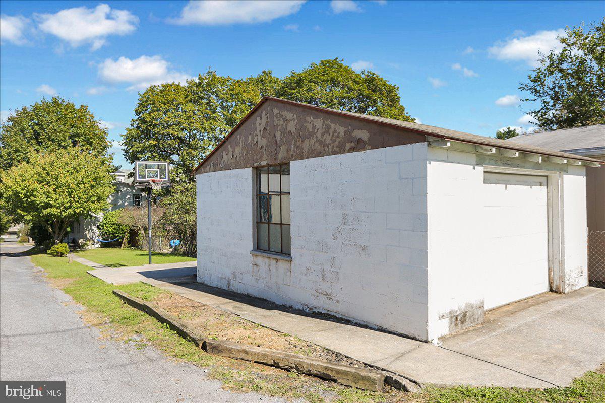 32 2nd Street Shillington, PA 19607 - Photo 24 of 26 a front view of a house with a yard and garage