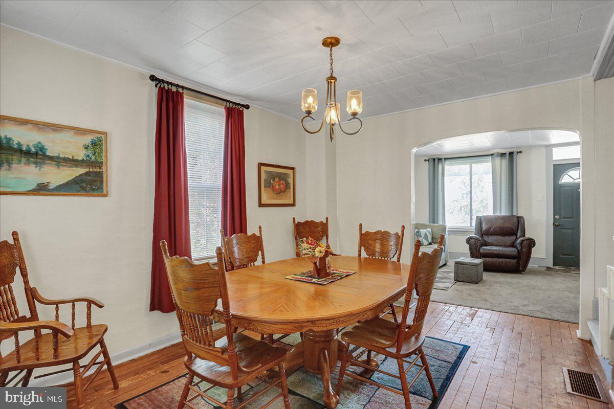 32 2nd Street Shillington, PA 19607 - Photo 6 of 26 a view of a dining room with furniture and wooden floor