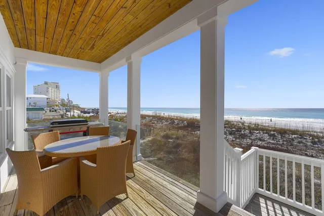 a room with pool table and furniture