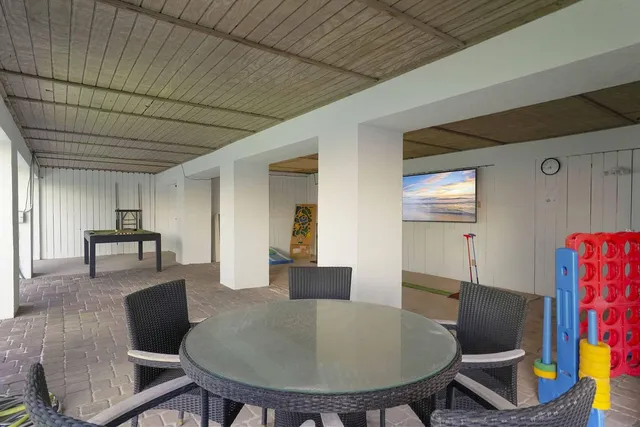 a kitchen with a refrigerator stove and sink