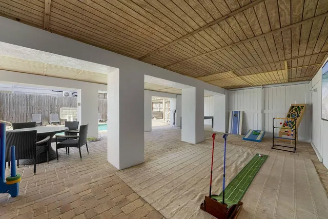 a kitchen with stainless steel appliances a stove a sink refrigerator and a microwave