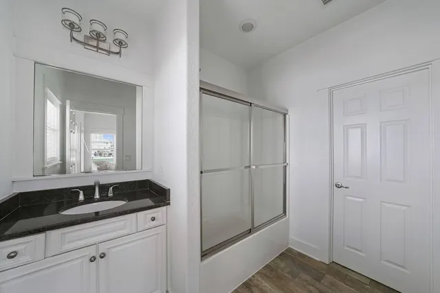a kitchen with lots of counter top space and dining table