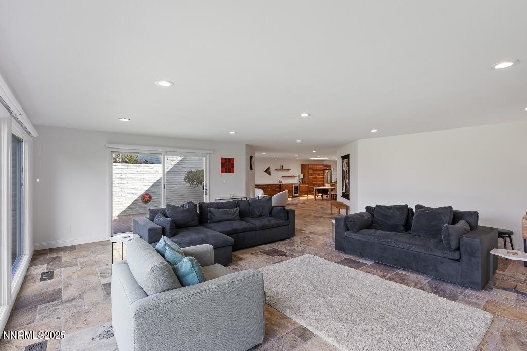 4811 Lakeridge Terrace West Reno, NV 89509 - Photo 13 of 43 a living room with furniture and a couch
