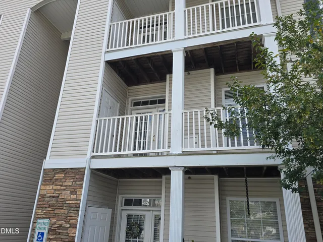 a view of a house with a window and stairs