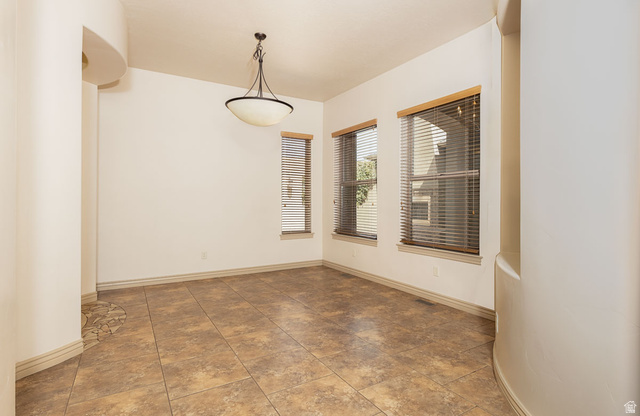 888 East Fiddlers Canyon Road Cedar City, UT 84721 - Photo 19 of 74 Empty room featuring baseboards