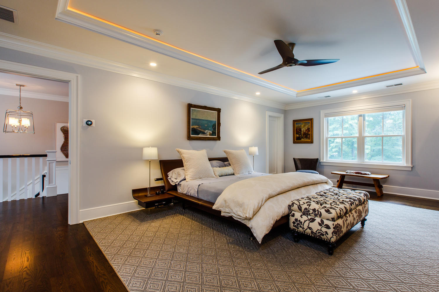 75 Parish Road New Canaan, CT 06840 - Photo 19 of 30 a bedroom with a bed and wooden floor