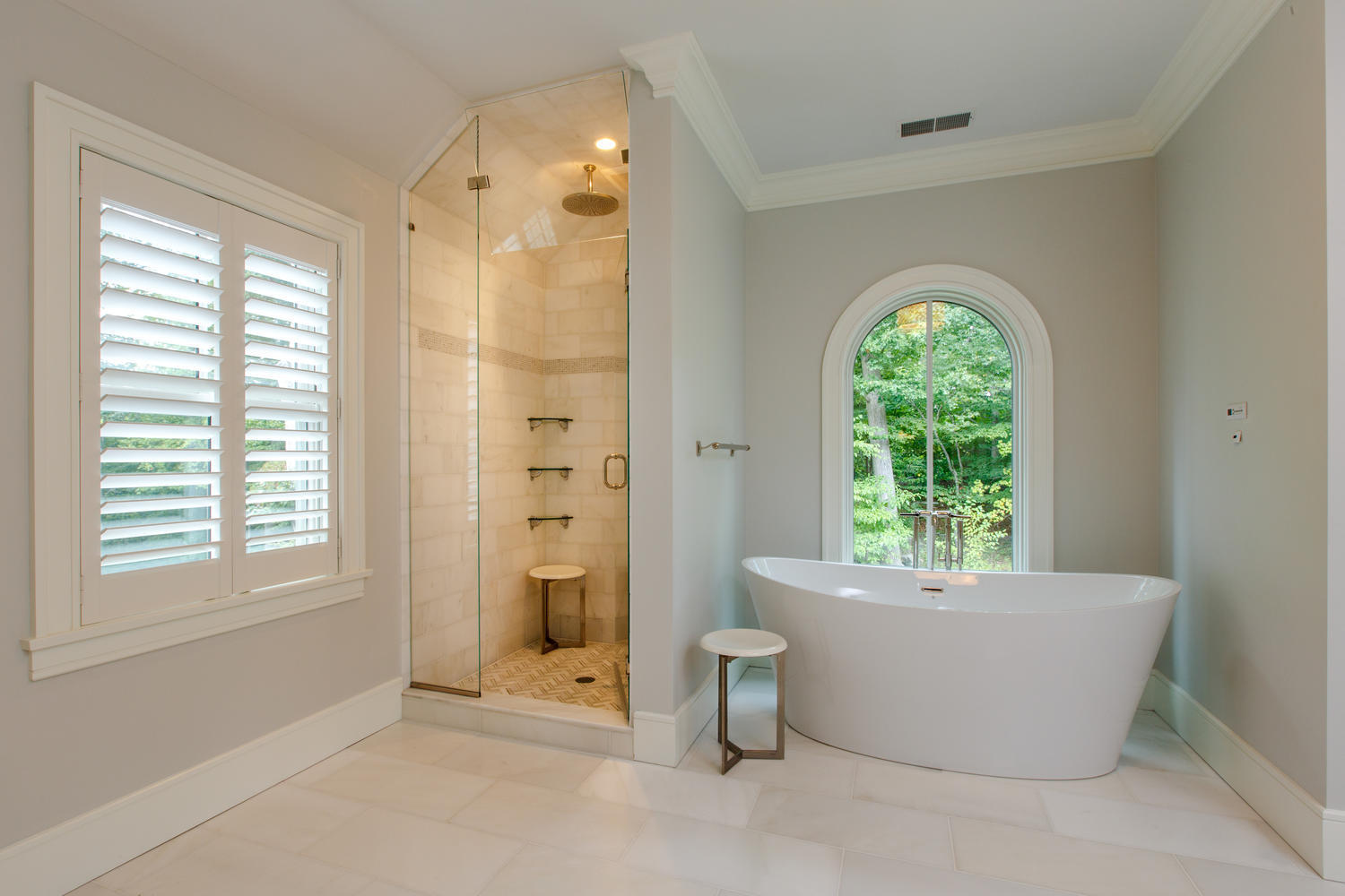 75 Parish Road New Canaan, CT 06840 - Photo 21 of 30 a bathroom with a bathtub and shower
