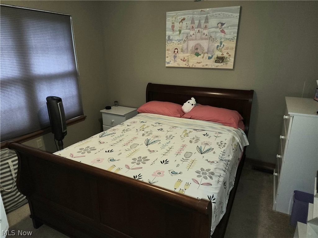 9890 Hoose Road Mentor, OH 44060 - Photo 16 of 30 Bedroom with dark colored carpet