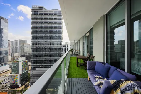 a balcony with furniture