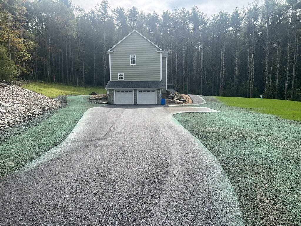 122 Town Farm Road Barre, MA 01005 - Photo 4 of 9 a front view of a house with garden