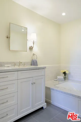 a outdoor living space with furniture and a fireplace