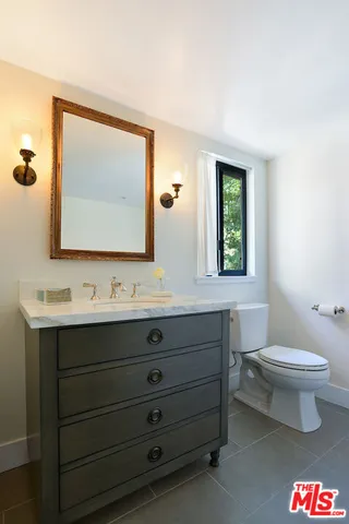 a view of swimming pool with outdoor seating