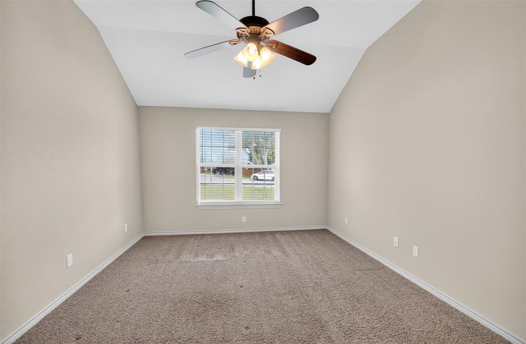 505 East 5th Street Springtown, TX 76082 - Photo 15 of 39 wooden floor in an empty room with a window